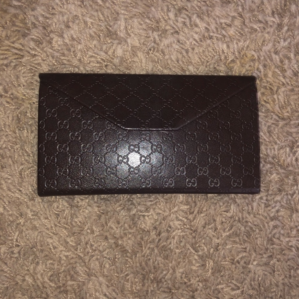 Gucci envelope like- sunglasses case.